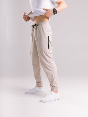 Бежеві чоловічі джогери. Джогери плащівка спорт чоловічі Pobedov Yoxo. Штани джогери з кишенями