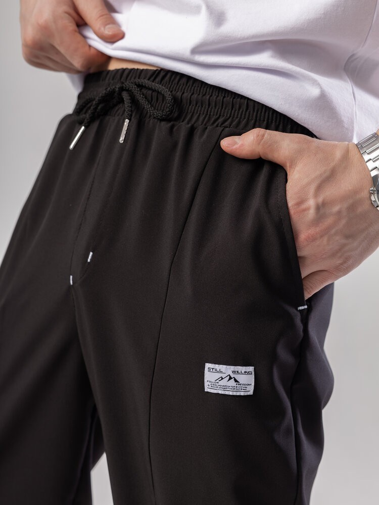 Чорні джогери для чоловіків. Чоловічі демісезонні легкі штани джогери Pobedov Savaya