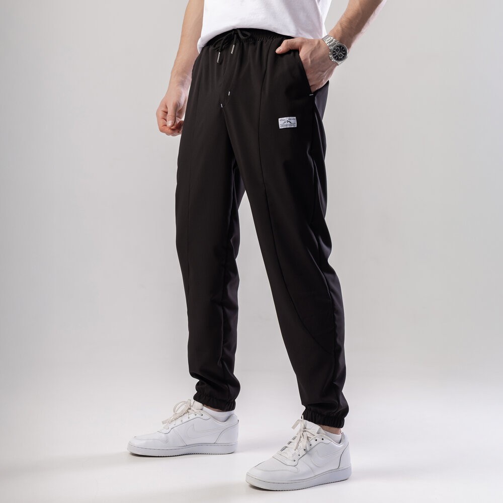Чорні джогери для чоловіків. Чоловічі демісезонні легкі штани джогери Pobedov Savaya