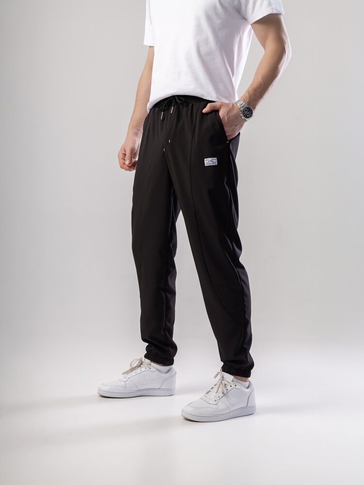 Чорні джогери для чоловіків. Чоловічі демісезонні легкі штани джогери Pobedov Savaya